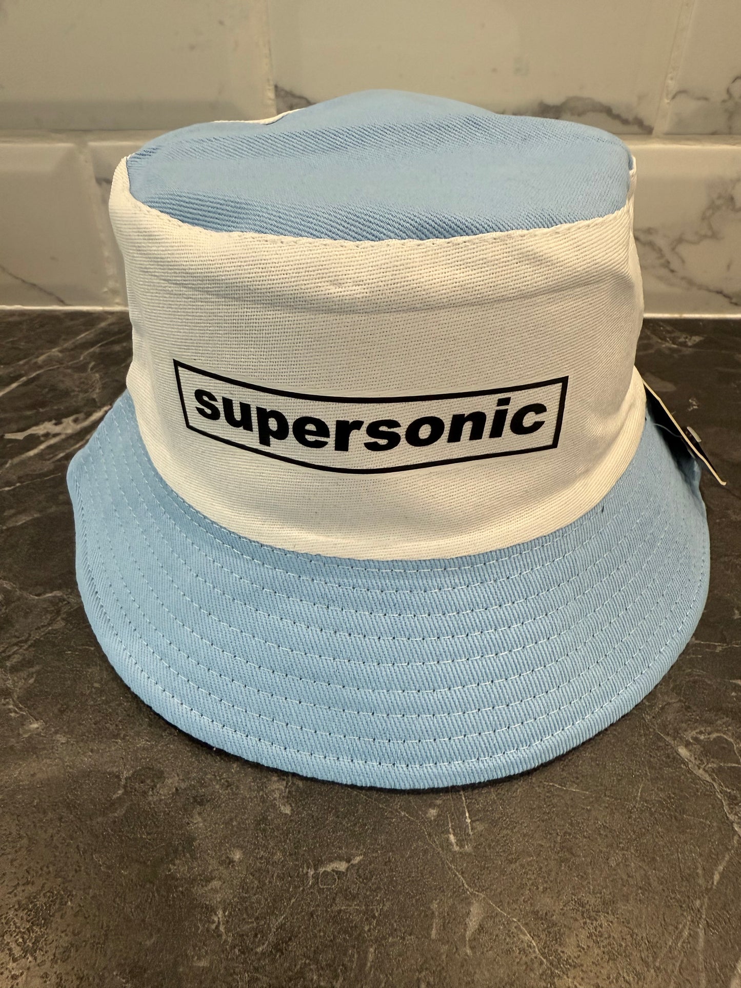 Supersonic Oasis inspired bucket hat