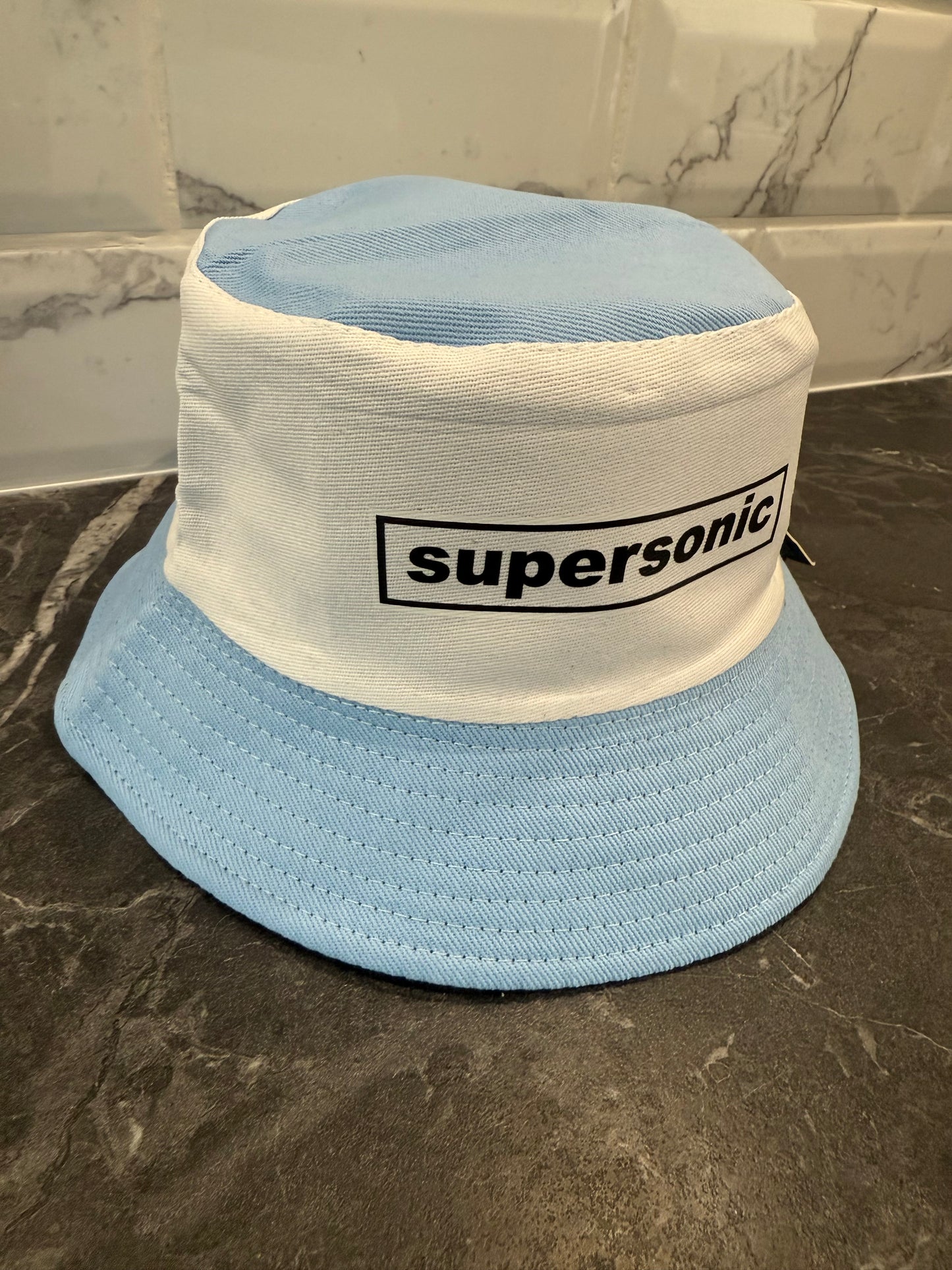 Supersonic Oasis inspired bucket hat